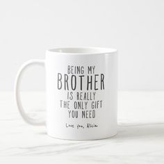 a white coffee mug that says, being my brother is really the only gift you need