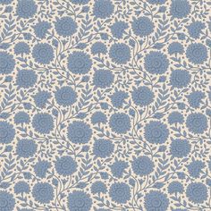 a blue and white wallpaper with flowers in the center, on a beige background