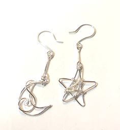 Silver Moon and Star Earrings Mismatched Earrings | Etsy Celestial Silver Wire Wrapped Earrings, Funky Crafts, Diy Earrings Materials, Moon And Star Earrings, Funky Earrings, Silver Jewelry Earrings, Jewelry Accessories Ideas, Mismatched Earrings, Earring Tutorial