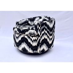 a black and white chevroned chair on a white background