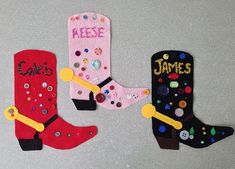 three pairs of cowboy boots decorated with buttons and letters that spell it's time to dress up