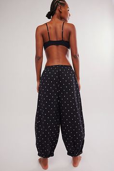 Inspired by our Sunday Morning Boxer Shorts, these laidback lounge pants are featured in a soft cotton fabrication and slouchy silhouette with faux button detailing and rolled hemlines. **Fit:** Slouchy, relaxed fit; mid-rise, ankle-length style **Features:** Soft cotton fabrication, smocked elastic waistband, faux button detail, pockets for hands, rolled hemlines with cinched detail **Why We ❤ It:** These effortlessly easy pants can be pulled on with your favorite cami for the perfect lounge-re Lounge Trousers, Lounge Style, Winter Fit, Boxer Shorts, Fit Inspo, Sunday Morning, Lounge Pants, Boho Clothing, Button Detail