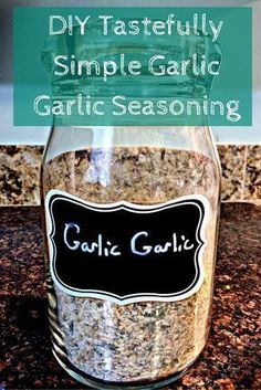 a glass jar filled with garlic seasoning sitting on top of a granite countertop