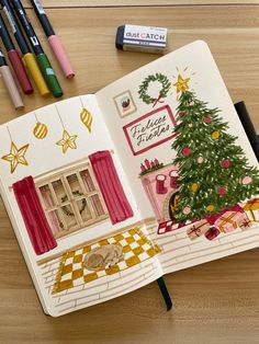 an open christmas book with markers and crayons