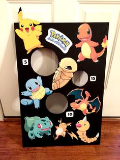 a cardboard box with pokemon stickers on it