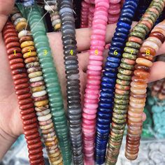 Material:  1. Red jasper 2. Crazy lace agate 3. Green aventurine 4. Gray agate 5. Pink jade (dyed) 6. Lapis lazuli 7. Unakite 8. Red agate 9. White agate 10. Green jade (dyed) 11. Green malachite (synthetic) 12. Cherry quartz (synthetic) 13. Blue turquoise (synthetic) 14. Black agate 15. White crystal 16. Picture jasper 17. Amethyst 18. Yellow aventurine 19. Tiger eye 20. Mahogany obsidian 21. White jade 22. Indian agate 23. Rose quartz 24. Dalmatian jasper 25. White opalite (synthetic) 26. Red brecciated jasper 27. Mixed color 28. Blue spot jasper Shape: flat rondelle  Size: approx 4*12 mm Quantity: 1 strand    approx 50 beads If you want a large quantity, please feel free to contact me. We will give you the best quality and the best price. Round Gemstone Beads For Jewelry Making, Rondelle Natural Stones Beads For Jewelry Making, Artisan Round Gemstone Beads And Cabochons, Round Spacer Beads For Jewelry Making, Spacer Beads For Jewelry Making, Artisan Round Beads For Jewelry Making, Agate Gemstone Beads, Agate Gemstone Round Beads, Colorful Round Agate Beads