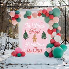 a sign that says oh, what fun is one with balloons and christmas trees on it