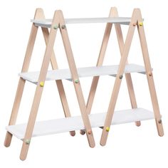 two wooden shelves with white shelves on them