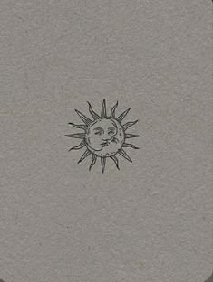 a drawing of a sun with the face of a man