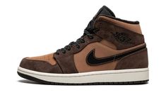 The Air Jordan 1 Mid SE “Earth Tone” is a rugged update to Michael Jordan’s first signature shoe in the popular mid-top style that features earth tones on its design.  Living up to its nickname, the “Earth Tone” colorway of the retro basketball shoe is assembled in neutral, earth tones like brown and tan for an autumnal look.  Dark Chocolate-colored suede appears on the overlays.  The perforated toe, mid-panel, and collar appear in a lighter brown shade of synthetic nubuck.  A black Swoosh with Earth Tone Shoes, 70s Converse, Nike X Travis Scott, Converse Run Star Hike, Converse Run, Retro Basketball Shoes, Air Jordan 1 Mid Se, Converse Run Star, Earthy Brown