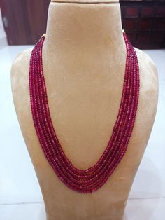 Material: Beads. Mala made up of beads. Most eligible gift for someone you love and someone very special for you. Best gift for your anniversary. Best gift for her Birthday. Necklace : 1 Length : 20 inches  and 22 inches customise as per your choice. Ruby Mala Beads, Ruby Necklace For Diwali Gift, Red Beaded Kundan Necklace In Temple Style, Handmade Red Kundan Necklace, Handmade Red Kundan Necklace With Round Beads, Red Kundan Necklace With Round Beads In Temple Style, Ruby Kundan Necklace With Cutdana For Gifts, Bollywood Style Ruby Temple Necklace Gift, Bollywood Ruby Temple Necklace Gift