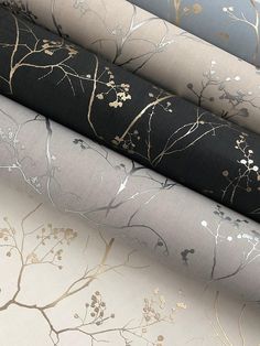 four different types of wallpaper with gold and silver leaves