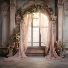 an archway with sheer curtains and flowers on it