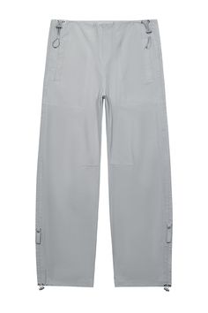 Effortlessly stylish and comfortable, the Archer Wide Leg Pants feature a bungee waist and leg opening for the perfect fit. The wide leg design adds a modern twist to your look. Expertly crafted with adjustable elements, these pants offer both functionality and fashion. 55% Cotton 45% Nylon Model is 5'8" and wearing a size small Stretch Wide-leg Utility Parachute Pants, Solid Color Wide-leg Parachute Pants With Belt Loops, Non-stretch Wide Leg Parachute Pants With Pockets, Stretch Nylon Wide-leg Parachute Pants, Stretch Khaki Full-length Parachute Pants, The Archer, Sweater Jumpsuit, Short Vest, Boxy Tee