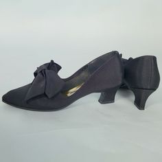 Vintage 80s Bow Heels by Mootsies Tootsies! VERY Marie antoinette style/17th century king vibes. Super Cute for a Goth Witchy look for Halloween. Size not marked, fits approx. a 5Insole: 9"Heel: 1 7/8" Retro Heels For Party, Retro Heels For Evening, Retro Fall Party Heels, Retro Fitted Heels For Evening, Retro Evening Heels For Fall, Vintage Evening Heels For Fall, Vintage Fitted Pointed Toe Heels, Fitted Vintage Heels With Pointed Toe, Vintage Heels For Formal Fall Occasions