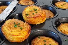 some food is sitting in the pans ready to be cooked