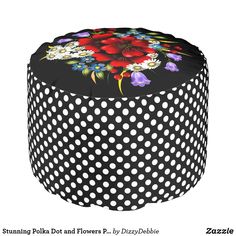 a black and white polka dot ottoman with flowers on it