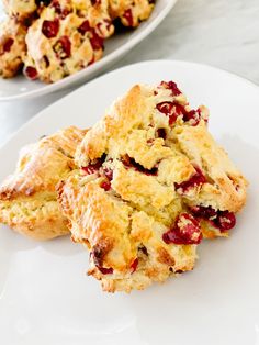 scones with cranberry filling on a white plate