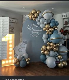 balloon arch in the shape of a rocket ship for a birthday party or baby shower