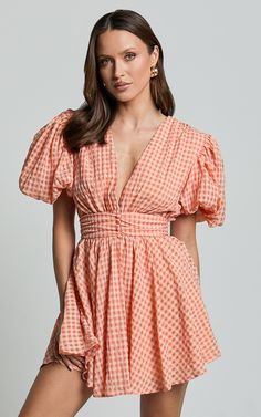 Xandy Mini Dress - Textured Puff Sleeve Plunge Dress in Peach | Showpo USA Peach V-neck Dress For Brunch, Peach V-neck Spring Dress, Coral Dress For Spring Brunch, Apricot V-neck Mini Dress For Summer, Summer V-neck Mini Dress In Apricot, Summer V-neck Apricot Mini Dress, Spring Orange Mini Dress With Puff Sleeves, Spring Coral Fitted Dress, Summer Apricot Mini Dress With Short Sleeves