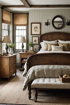 a large bed sitting in a bedroom next to a dresser and window with two lamps