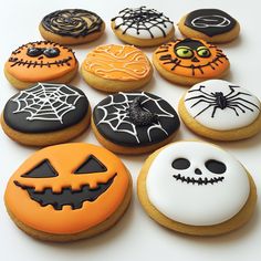 halloween decorated cookies arranged in the shape of jack - o'- lanterns and pumpkins