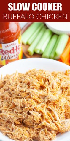 slow cooker buffalo chicken on a white plate