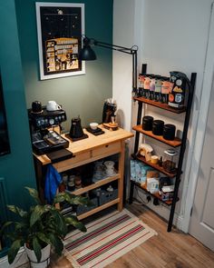 a coffee shop with shelves, potted plants and other items on the counter top