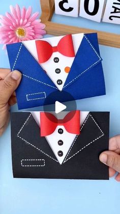 someone is making an origami tuxedo card