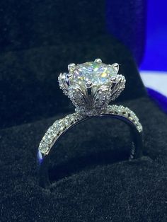 an engagement ring with diamonds on it