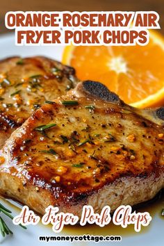 orange rosemary / air fryer pork chops on a plate with an orange slice