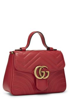 Brand: GucciColor: RedFeatures: Pre-Loved Condition: Excellent; Minor creasing on exterior Length: 8" (20 cm), Height: 5.75" (14 cm), Depth: 3" (7 cm), Strap Drop: 2.25" (5 cm)/ 21" (53 cm) Made in Italy Leather Top Handle, Optional Shoulder Strap Push-lock Closure Under Flap Microfiber Lining Antiqued Gold Hardware EAN: 0197291507940Package Dimensions: 8.0 x 5.7 x 3.0 inches Gucci Gg Marmont, Gg Marmont, Cow Boy, Diaper Backpack, Vuitton Bag, Issey Miyake, Quilted Leather, Handle Bag, Thom Browne