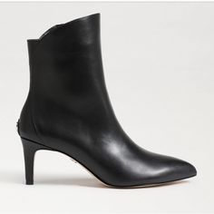 Make Your Look Extra Sleek With Our Usha Bootie, Teaturing A Pointed Toe And Stiletto Heel. Heel Height: 2.5 Inches Toe: Pointed Toe Closure: Zipper Boot Shaft: 5.3 Inches Calf Circumterence: 10.2 Inches Material: Leather Insole: Synthetic Black In Color Size 6.5 New Without Box Elegant Pointed Toe Booties Medium Width, Elegant Low Heel Medium Width Booties, Elegant Ankle-high Heeled Boots With Heel Tab, Elegant Low Heel Booties, Elegant Medium Width Booties For Work, Elegant Heeled Boots With Heel Tab, Medium Width, Formal Pointed Toe Heeled Boots With Heel Pull Tab, Elegant Booties With Reinforced Heel For Work, Formal Low Heel Booties With Reinforced Heel