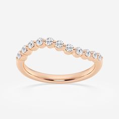 Revel in the ethereal beauty of this floating diamond wave band. Perfect for bohemian brides that love to go with the flow, this dainty lab grown diamond wedding band will beautifully complement engagement rings with round cuts. Create a truly unique wedding stack with this magical floating diamond wave band! Modern Twist Rose Gold Wedding Diamond Ring, Wedding Stack, Go With The Flow, Pearl And Diamond Earrings, Bohemian Bride, Stackable Ring, Pearl Diamond, Ethereal Beauty, Stackable Rings