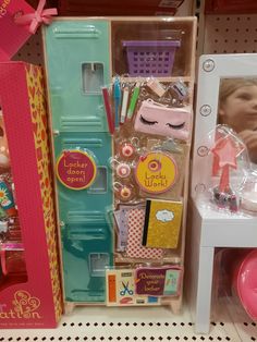 there is a doll house in the store with its contents packed and ready to be bought