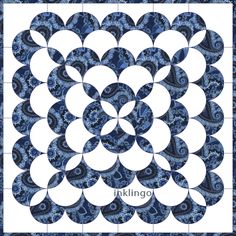 a blue and white circular quilt with the words inkling written in black on it