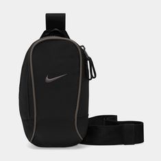 The Nike Sportswear Essentials Crossbody Bag features 2 zippered pockets to let you keep the small stuff organized and easy to grab. The accessory pocket zipper pull offers quick access to smaller items, while an adjustable strap and buckle provide an easy on and off fit. Nike Backpack, Mens Crossbody Bag, Tennis Bag, Black Sportswear, Nike Bags, Polo Sport Ralph Lauren, Small Stuff, Adidas Adilette, Nike Shox