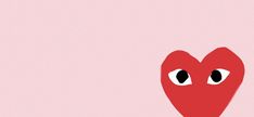 a red heart with two eyes on a pink background