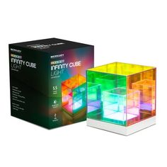 a box that has some kind of colorful cube in it's front and side