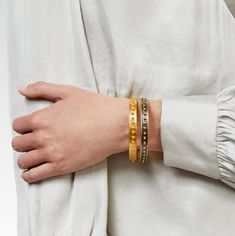 One is fun, but a full stack of these slim bangles makes a real statement. Available in gold or mixed metal, each features a studded motif that calls to mind the lasting appeal of SoHo’s cast iron architecture and ‘80s-era grit. 24K gold plate 0.3 inch diameter Julie Vos hallmark Jewelry Care:-Our jewelry is hand set in 24k gold plate over nickel-free brass and sealed to prevent tarnish.-Maintain the jewelry's beautiful luster by avoiding contact with lotion, perfume, makeup, or any harsh cleani Iron Architecture, Cast Iron Architecture, One Is Fun, Julie Vos, Chinoiserie Wall, Stackable Bangles, Mirror Artwork, Bangles Making, Stacked Bangles