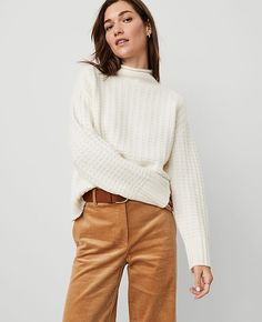 With season-perfect waffle texture, our roll neck sweater is one to cozy up to. Roll neck. Long sleeves. Drop shoulders. Ribbed cuffs and hem.,Hit:22" long,Imported:Imported,Fit:Softly fitted,Fabrication:100% Cashmere,Garment Care:Dry Clean Only Premium Waffle Stitch Roll Neck Sweater by Ann Taylor Size regular - XL Pale Ivory Women's 100%, Cashmere, Turtleneck, Long, Sleeve, Pullover, Sweaters, 100%, Cashmere, Dry, Clean, Only Best Fall Sweaters Waffle Stitch, Turtleneck Long Sleeve, Roll Neck Sweater, Cashmere Turtleneck, Roll Neck, Fall Sweaters, Long Sleeve Pullover, Neck Sweater, Pullover Sweaters