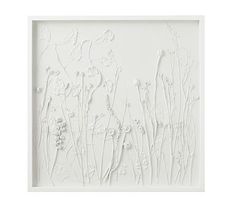 an art work with white flowers and plants on the wall, in front of a white background