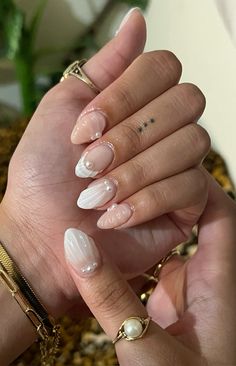 mermaid nail inspo, short mermaid nails, seashell nails, short ombre almond nails, pearl nails, thumb nail inspo, nude white ombre almond nails, nude white and pink nails, aesthetic nails, finger tattoos Almond Nails Seashell, Beach Nails Seashell, Seashell Gel Nails, Seashell Nails Short, White Seashell Nails, White Shell Nails, White Mermaid Nails, Almond Nails Pearl, Short Mermaid Nails