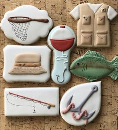 decorated cookies with fishing related items on them