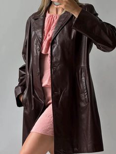 Elevate your outerwear collection with our Women's Burgundy Long Trench Coat. Combining luxury, functionality, and sustainability, this coat is perfect for the modern woman who values style and quality. Whether you're dressing for a formal occasion or adding a touch of sophistication to your everyday outfits, this coat will be your go-to for years to come. Whether you're running errands, heading to the office, or enjoying a night out with friends, our Women's Burgundy Long Trench Coat is the per Elegant Brown Leather Jacket With Button Closure, Classic Burgundy Leather Outerwear, Elegant Brown Leather Long Coat, Elegant Burgundy Outerwear With Button Closure, Elegant Long Brown Leather Jacket, Luxury Burgundy Outerwear For Fall, Leather Trench, Long Trench, Long Trench Coat