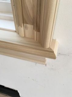 an unfinished window frame is shown in this image