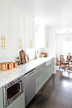 the kitchen is clean and ready to be used as a dining room or family room