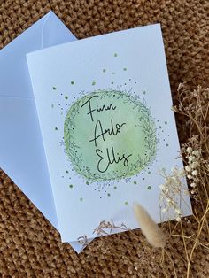 a card with the words time for bliss written on it next to some dried flowers