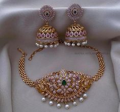 Sabyasachi Inspired South Indian Style Gold Finish Choker Set with Pearls and American Diamond Stones - Ruby Red & Emerald Green set includes Jhumki earrings Unique Choker Necklaces, South Indian Style, Engagement Necklaces, American Diamond Jewellery, American Diamond Necklaces, Indian Necklace, Bollywood Jewelry, Choker Necklace Set, Choker Set