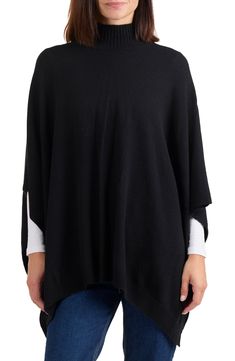 Layer up when the temperature drops with this funnel neck poncho knit from sumptuous cashmere yarns. 28" length Funnel neck 100% cashmere Dry clean Imported Oversized Long Sleeve Cashmere Poncho, Cozy Long Sleeve Cashmere Poncho, Oversized Cashmere Poncho, Oversized Cashmere Poncho For Winter, Cashmere Cape For Layering In Fall, Cashmere Cape For Fall Layering, Fall Cashmere Cape For Layering, One Size Cashmere Poncho For Layering, One Size Cashmere Poncho For Fall